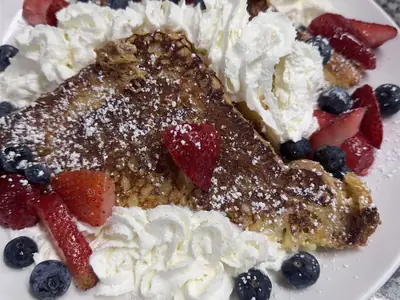 My Favorite French Toast Ever with powdered sugar