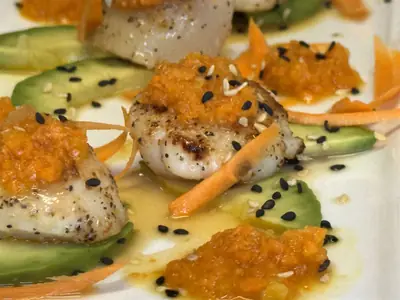 Scallops Makoto with ginger dressing and avocado